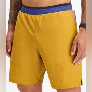 Fabletics Mens The Fundamental Short II 7in Athletic Shorts in Yellow and Purple